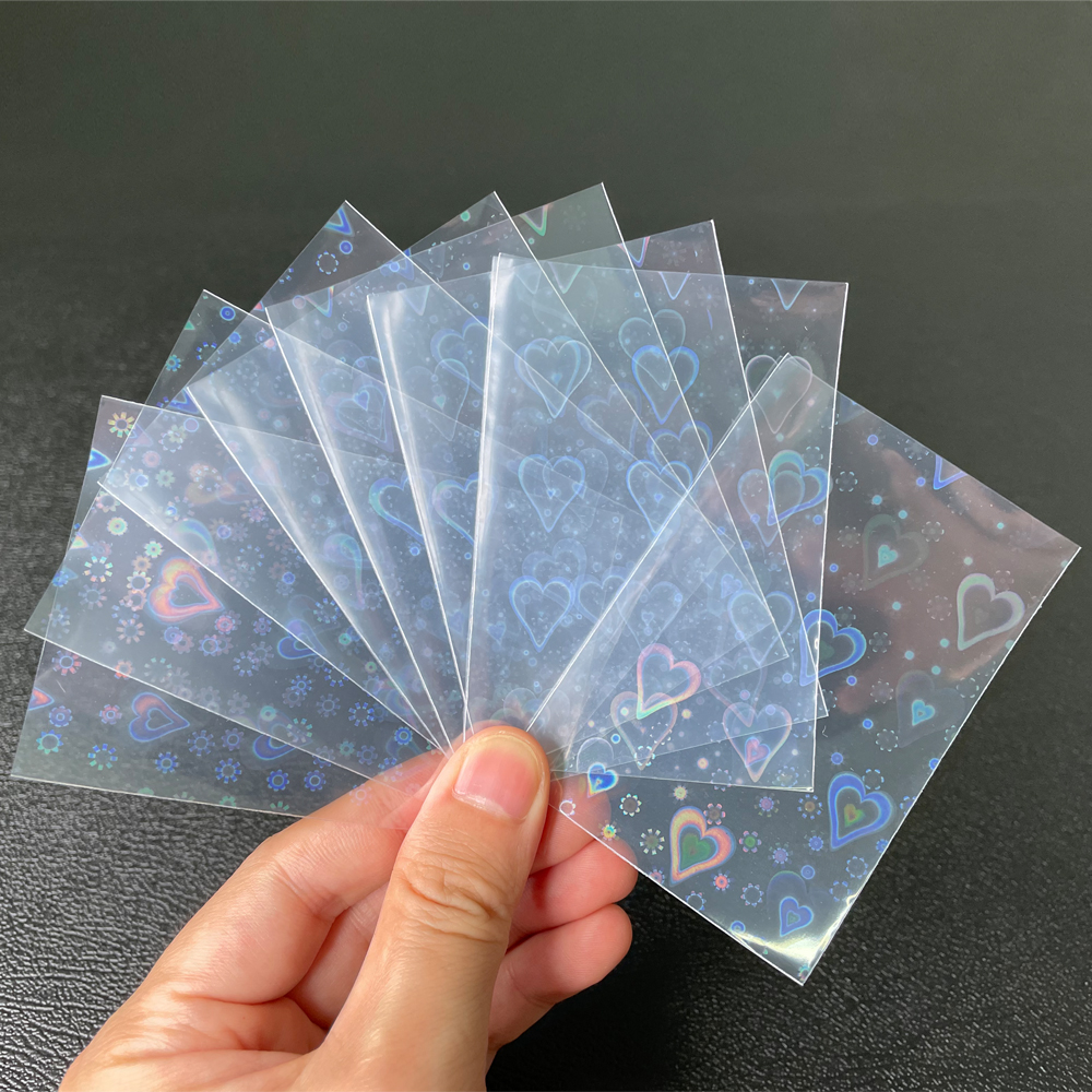100 Cái/lốc Hình Trái Tim Viền Laser Đầu Nạp Đạn TCG Thẻ Tay YGO Board Game Ảnh Tấm Bảo Vệ Thương Mại Thẻ Shield bao Da