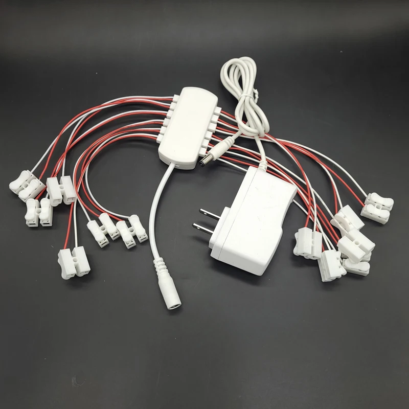 3 V/12 V AC/DC อะแดปเตอร์แหล่งจ่ายไฟ 12 พอร์ตแหล่งจ่ายไฟปลั๊ก Universal สําหรับรุ่นโคมไฟ/รถไฟ/รถไฟ/รถไฟ