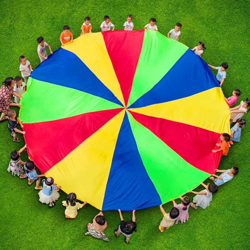 2 M/6 M เส้นผ่านศูนย์กลางเด็กการทํางานเป็นทีมกลางแจ้งเกม Prop Rainbow ร่มชูชีพของเล่นกระโดดกระเป๋า Bounce Play Mat โรงเรียนกิจกรรมปริศนาเกม