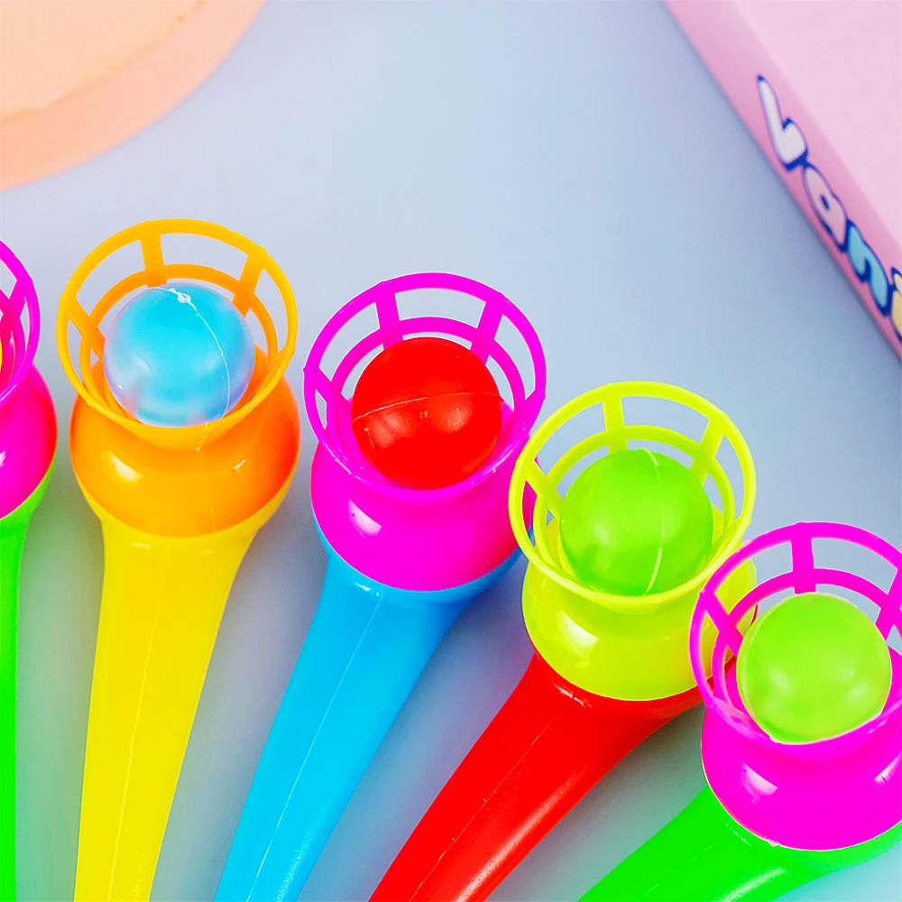 12Pcs 재미있는 마술 부는 파이프 플로팅 볼 게임 어린이 생일 파티는 기념품을 선호합니다 카니발 크리스마스 파티 상금 Piñatas 장난감