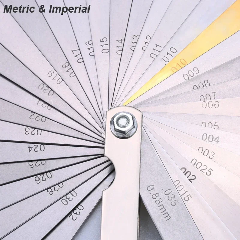 Righello in acciaio Spessimetro di spessore metrico Set di 32 lame Tappet con strumento di misurazione dello spazio in ottone Gamma di dimensioni di liquidazione Foglio di rame