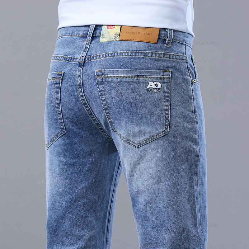 Pantalones vaqueros ajustados azul claro de primavera para hombre, pantalones vaqueros de tela elástica informales con estilo, pantalones clásicos gris humo