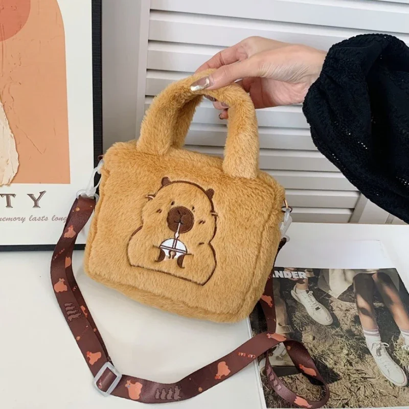 การ์ตูนตุ๊กตากระเป๋าถือCrossbodyอะนิเมะผลิตภัณฑ์น่ารักKapybaraตุ๊กตาPlushกระเป๋าเด็กCrossbodyกระเป๋าเหรียญ