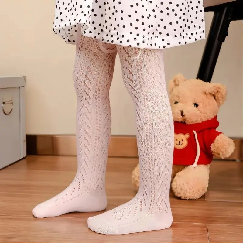 Collant estivi per neonate Calze a rete scavate per bambini Abbigliamento a rete Collant con fondo sottile stile Spagna per bambini