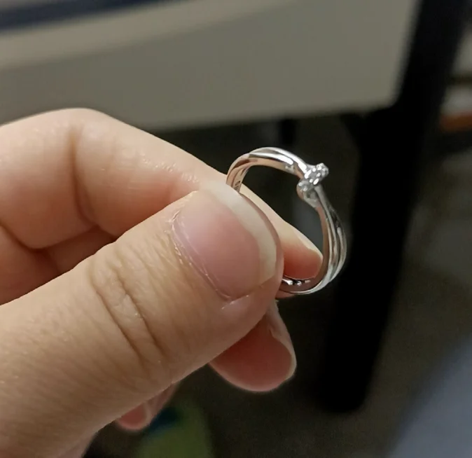 The ring lady has a simple opening that is adjustable