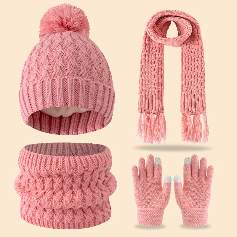 Un simpatico pile invernale a una sola palla e un set addensato di sciarpe, cappelli e guanti con nappe per bambini di 3-14 anni