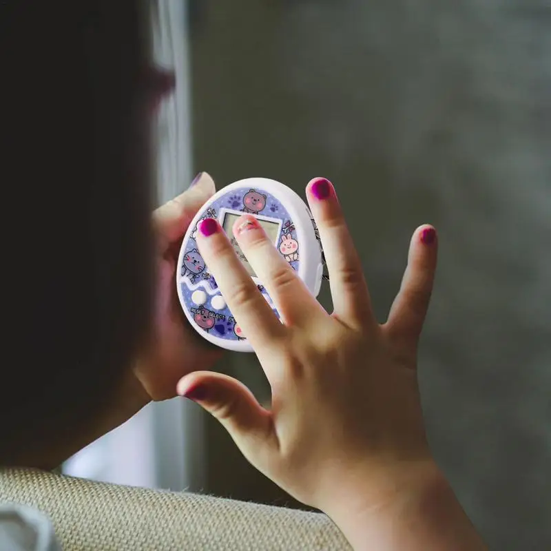 แบบพกพาRetro Tamagotchiสัตว์เลี้ยงอิเล็กทรอนิกส์ของเล่นพวงกุญแจเกมเด็กของขวัญการศึกษาตลก 90S Nostalgic Virtual Cyber Pet
