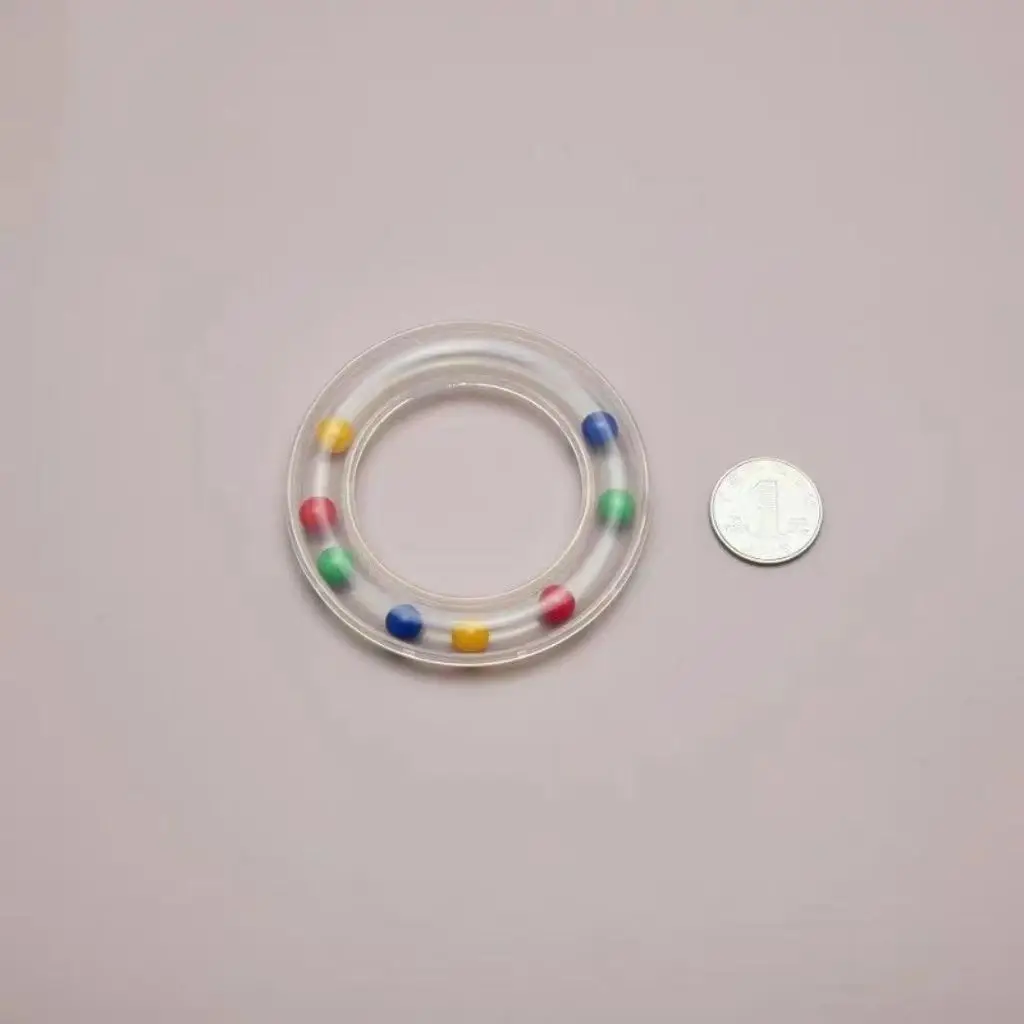 赤ちゃんと子供のためのプラスチック製のrattleラウンドリング,色付きのビーズ,ノイズメーカー,感覚トレーニング玩具,美しい教育