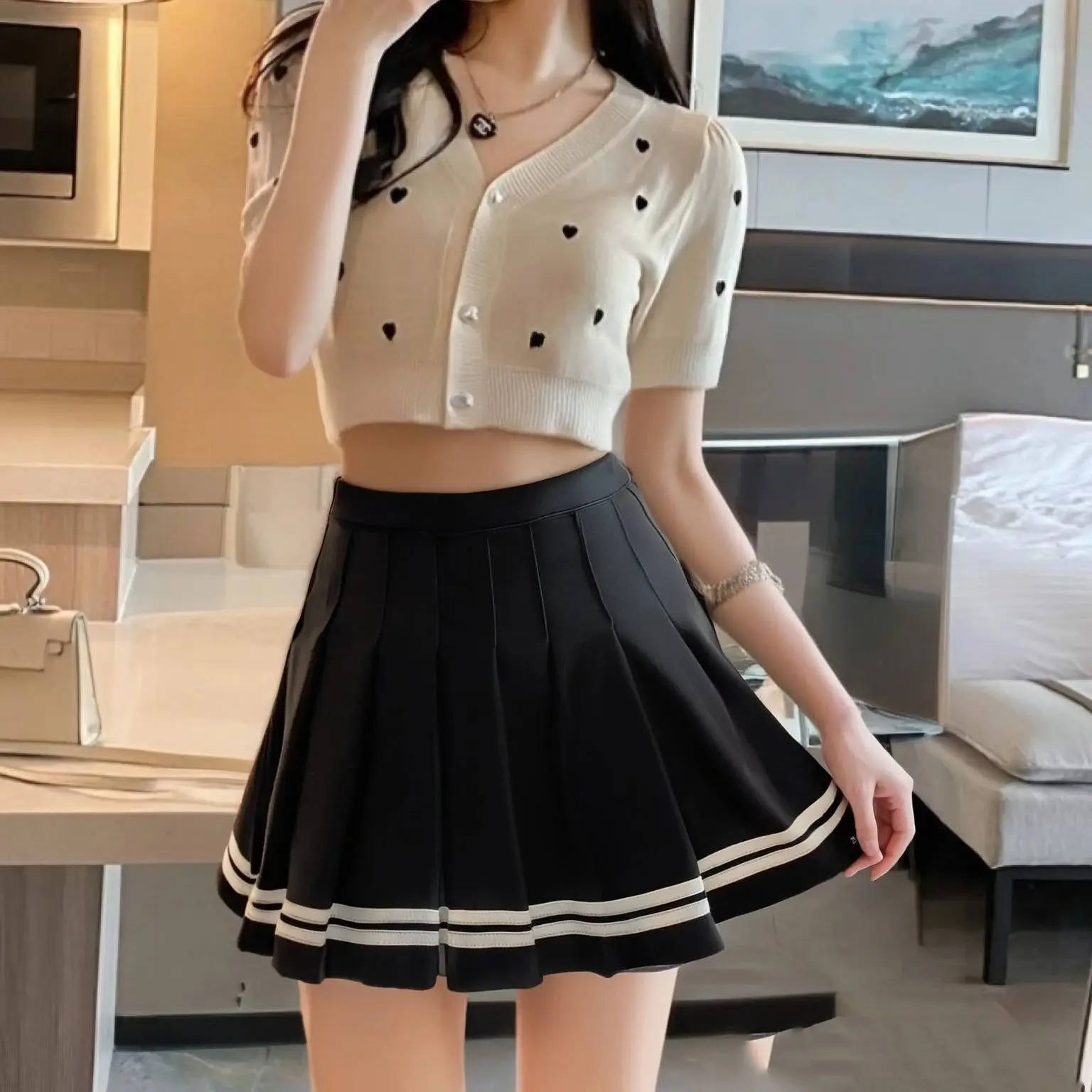 Moda stile preppy gonne a pieghe donna 2025 primavera estate nuova linea A abito corto dolce ragazza vita alta gonna petchwork strada