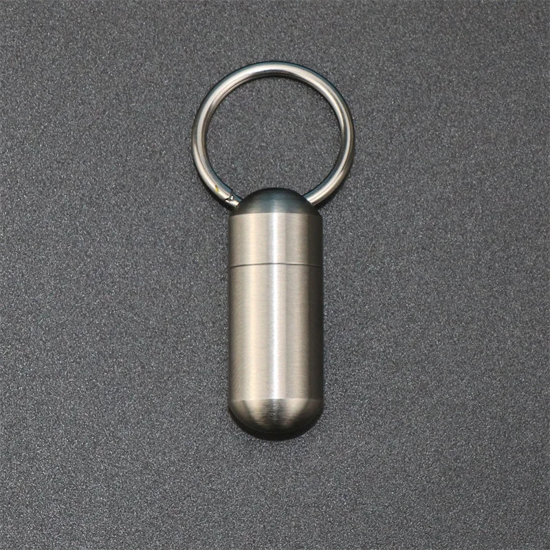Mini sigillato impermeabile in acciaio inossidabile 304 Contenitore portatile per pillola Contenitore sigillato per piccole parti di utensili Bottiglia di stoccaggio con portachiavi
