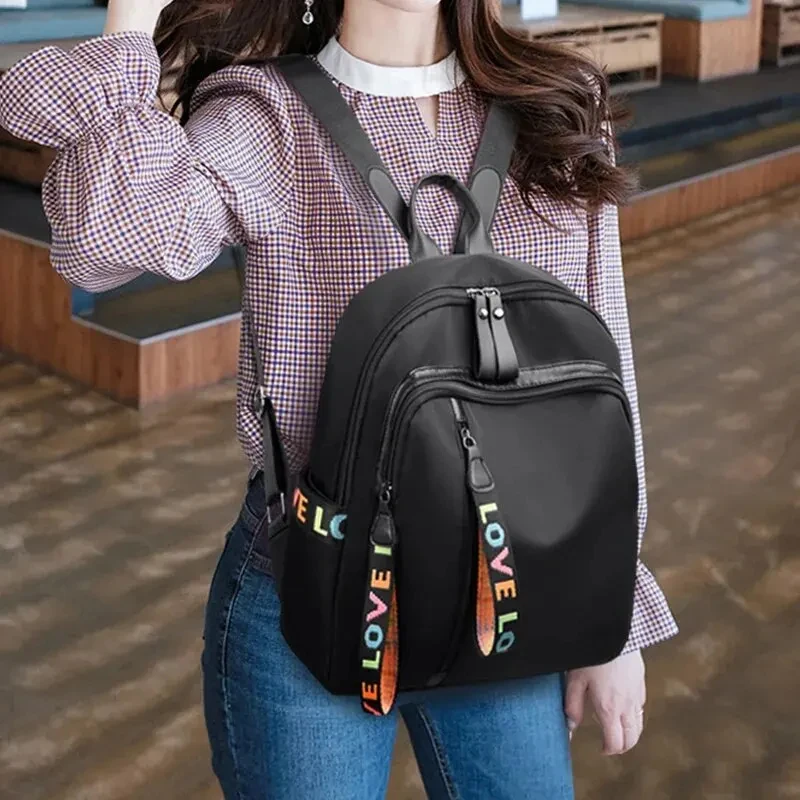 Mochila de tela Oxford de moda, bolso de viaje de gran capacidad con alcance Diagonal ligero, mochila de estilo universitario
