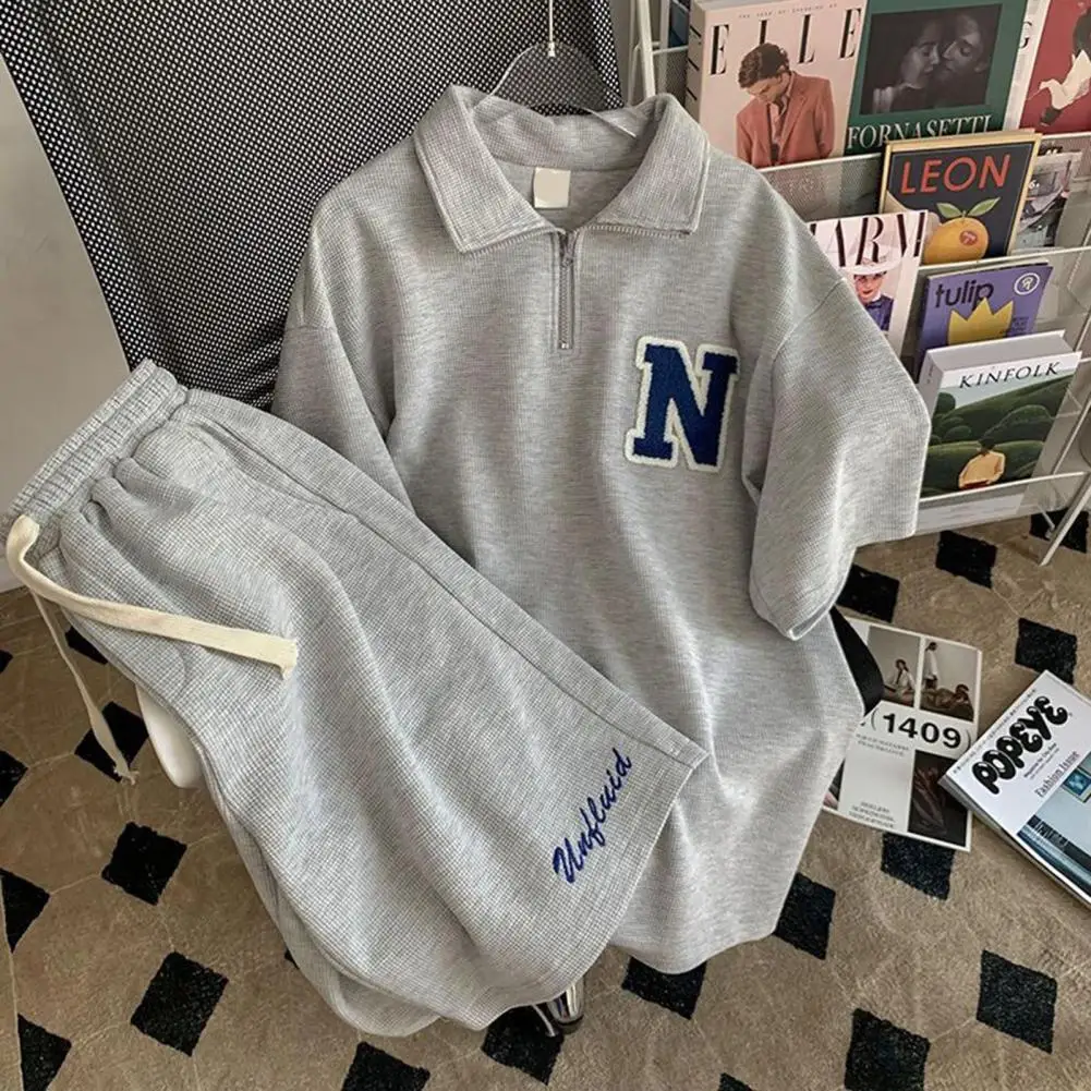 วาฟเฟิลชุดกีฬา Unisex ฤดูร้อนผู้ชายหลวมแขนสั้นเสื้อยืดกางเกงขาสั้น Jogger ชุด 2 ชิ้นชุดพิมพ์ชุดลําลอง