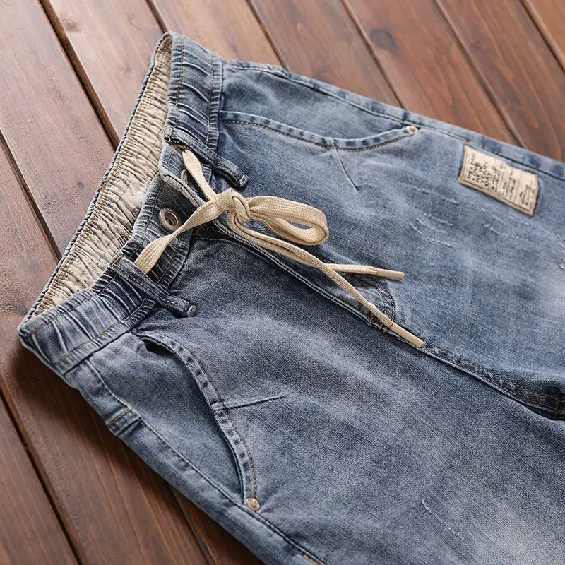 Ropa de lujo de estilo coreano, pantalones vaqueros de mezclilla para hombre con cordón de cintura elástica para otoño lavado, pantalones vaqueros elásticos informales para hombre