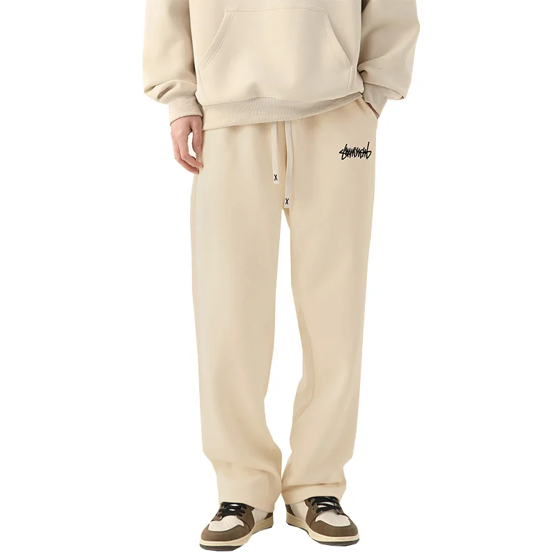 Pantalones para correr de pierna recta de color sólido para hombre, adecuados para deportes casuales como correr, gimnasio y actividades al aire libre.