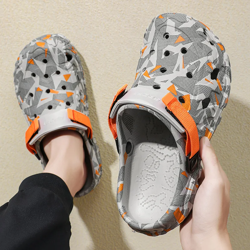 ผู้ชายใหม่ Clogs รองเท้าแตะรองเท้าแตะชายรองเท้าแบนรองเท้าแตะชายรองเท้าผ้าใบกลางแจ้ง Flip Flops บ้าน Clogs
