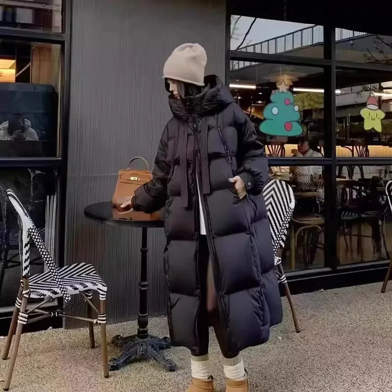 2025 nova jaqueta de algodão de inverno casaco longo feminino edição coreana solto grosso moda com capuz jaquetas feminino quente parker casaco