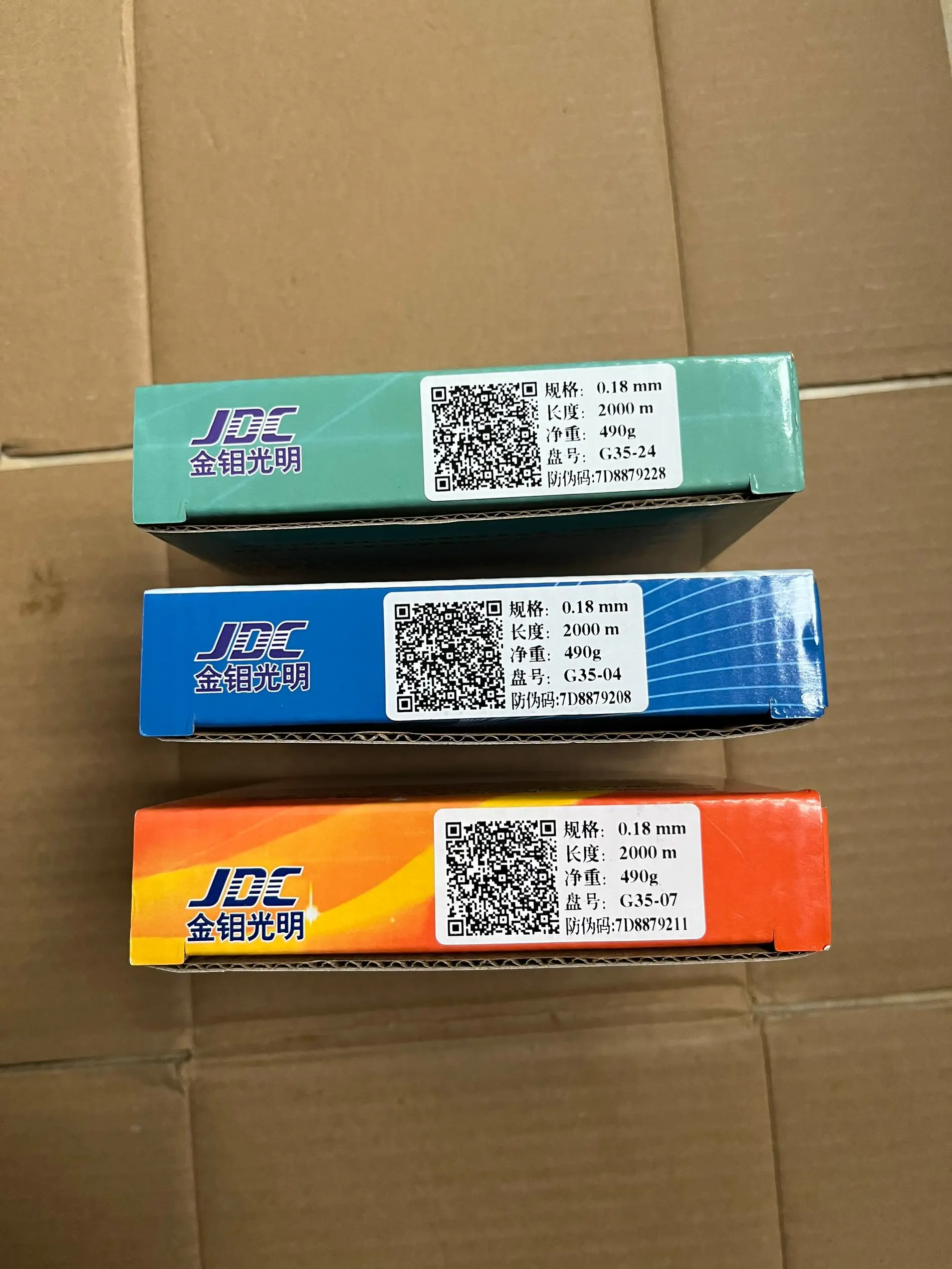 Original JDC Guangming โมลิบดีนัมลวด 0.18 มม.2000 M ต่อ SPOOL สําหรับ EDM ลวดตัดสีเหลืองสีฟ้าสีเขียว