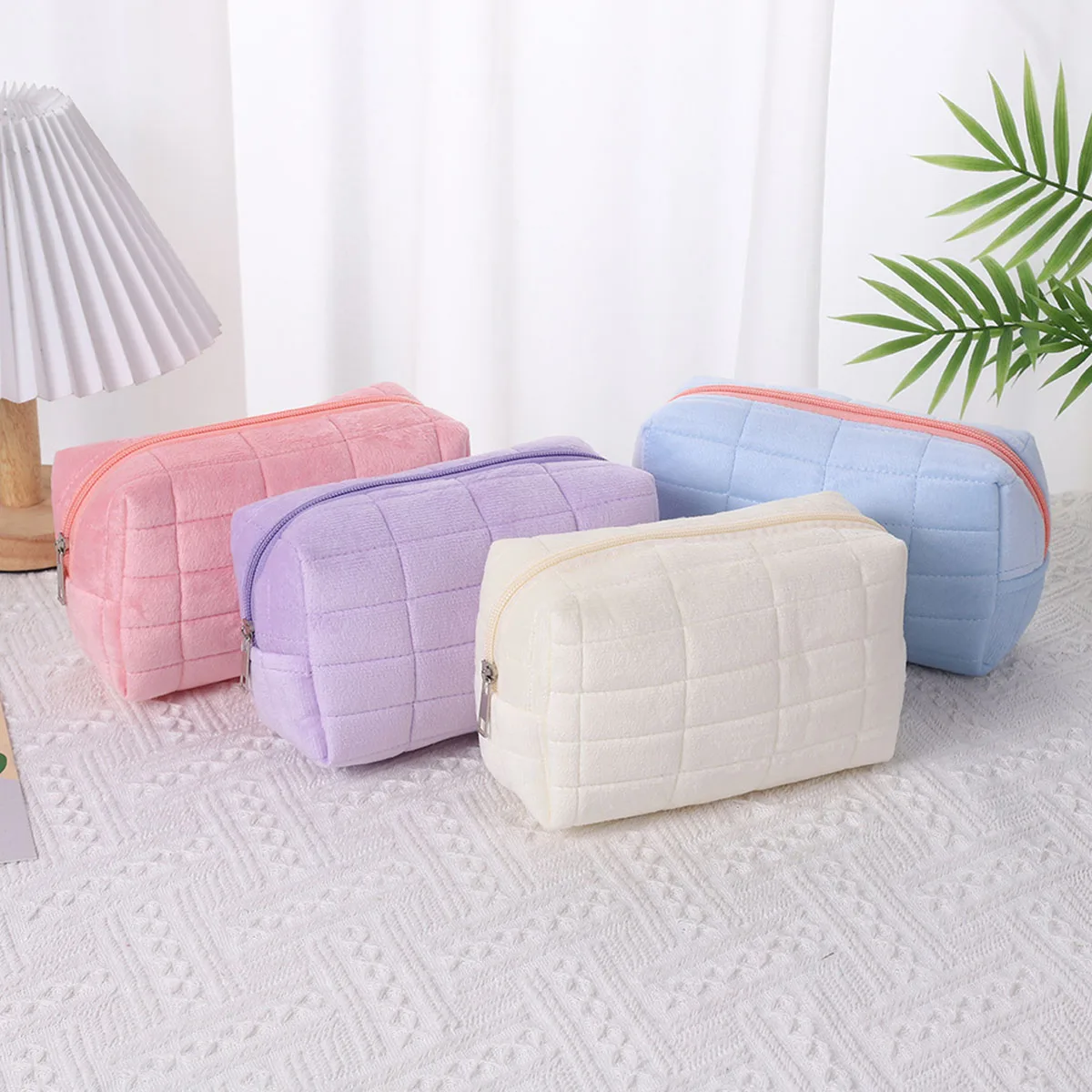 Bolsa de maquillaje, almacenamiento de almohadas, sentido de alta gama, bolsa de almacenamiento de gran capacidad