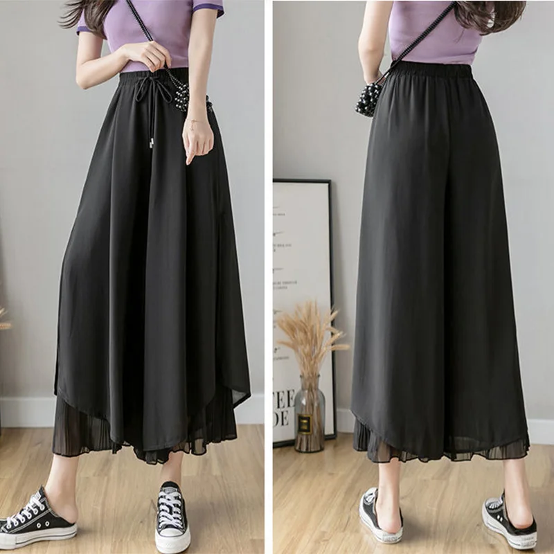 Calça elástica de perna larga feminina, culottes irregulares de bainha, camada dupla, calça coreana casual solta plissada de verão