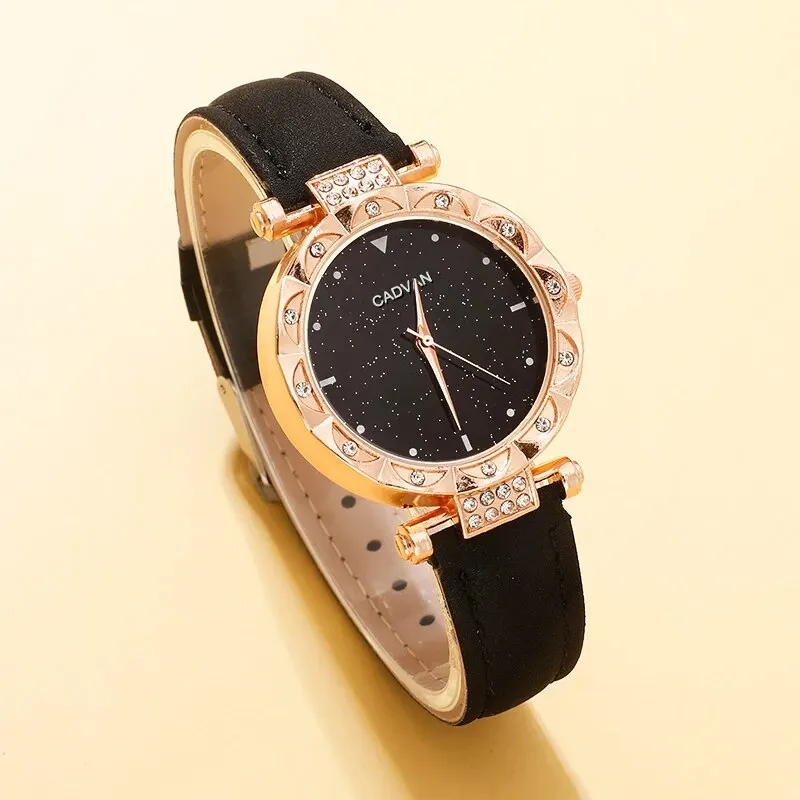 Reloj de pulsera de cuarzo con esfera redonda de cielo estrellado simple para mujer