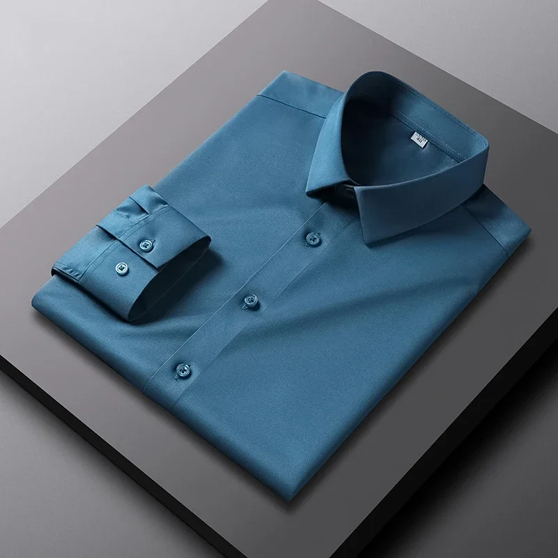 Camisa de color sólido de manga larga informal y de moda para hombre Top de negocios sin planchar y resistente a las arrugas