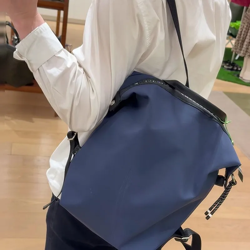 Nuovo zaino in nylon twill con doppia tracolla in vera pelle, zaino unisex e versatile