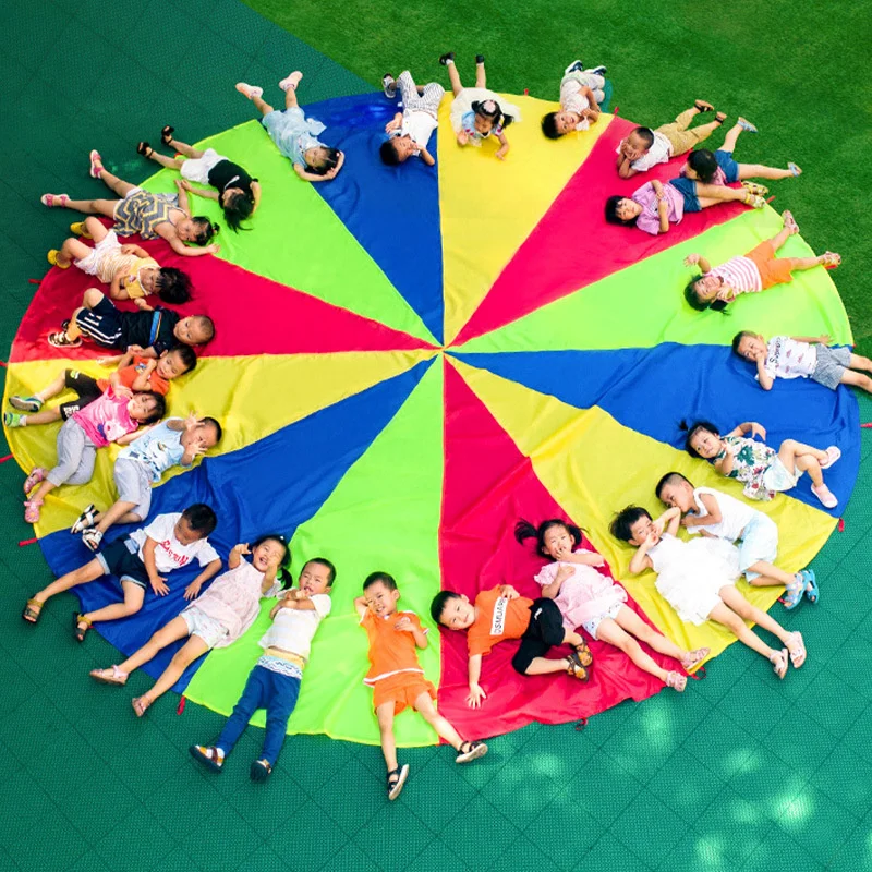 2 M/6 M เส้นผ่านศูนย์กลางเด็กการทํางานเป็นทีมกลางแจ้งเกม Prop Rainbow ร่มชูชีพของเล่นกระโดดกระเป๋า Bounce Play Mat โรงเรียนกิจกรรมปริศนาเกม