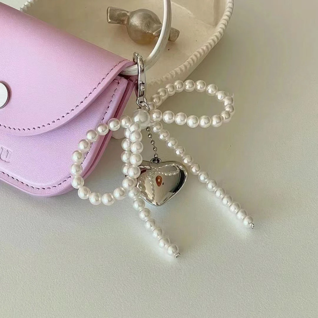 ZAKOL Weiß Bowknot Herz Schlüsselbund Frauen Süße Charme Perle Bogen Rucksack Schlüssel Ring Handgemachten Schmuck Ornament Taschen Anhänger Gif