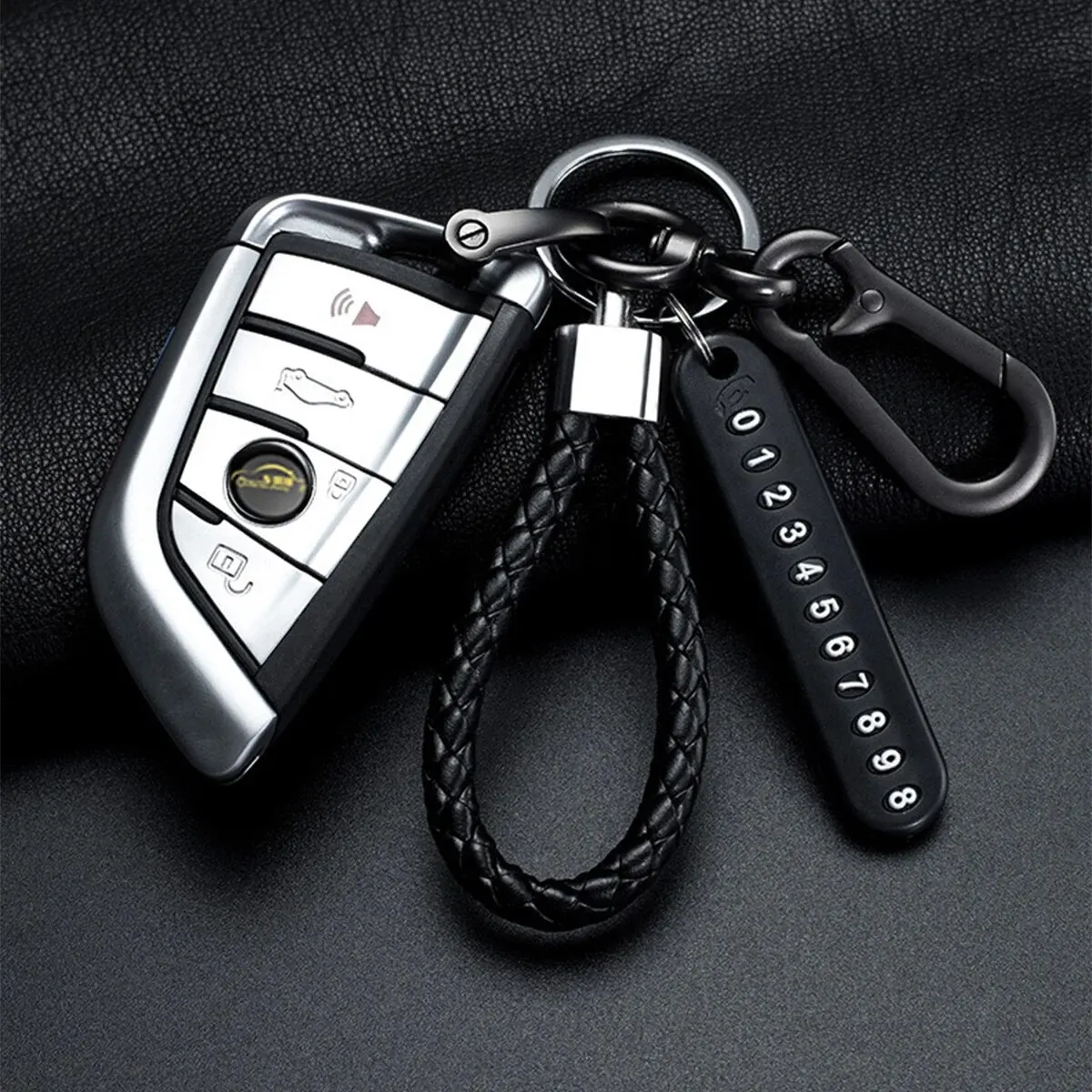 Llavero con colgante de placa de número de teléfono móvil DIY para hombre, cuerda de cuero tejida Simple Punk, accesorios de llavero de coche antipérdida