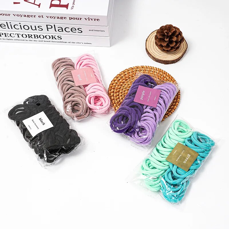 50 ชิ้นชุด Dual สีโฟร์ซีซั่นยืดหยุ่นสูงไม่มีรอยต่อเชือกผมเรียบง่ายและทนทานแฟชั่นหนัง Band Soft Knitt