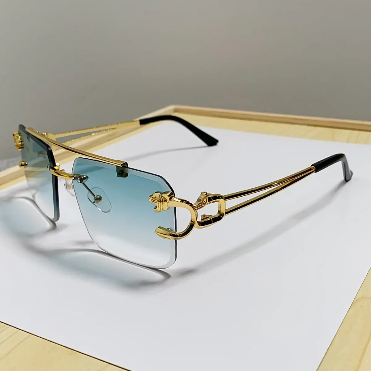 กรอบทองแฟชั่นแว่นตากันแดดโลหะเสือดาว Rimless แว่นตากันแดด Double Bridges Gradient Ocean ฟิล์ม Shades UV400