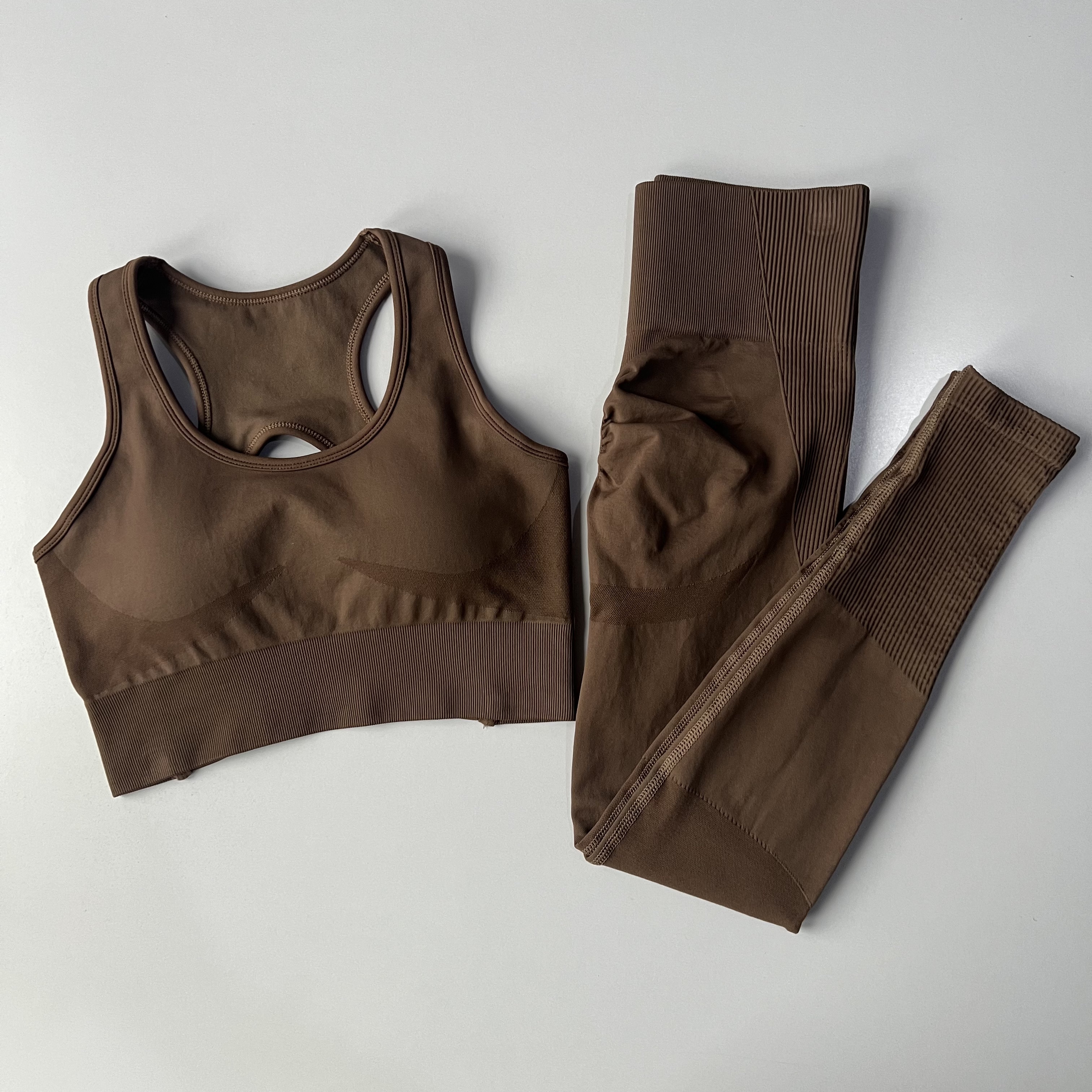 Set di tute da yoga ad asciugatura rapida per sollevamento del sedere color pesca Pantaloni da fitness Leggings a vita alta con reggiseni sportivi Set fitness per sollevamento del sedere color pesca