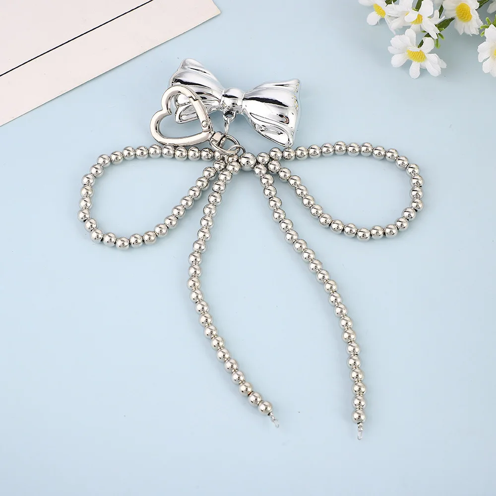 Yupsk 우아한 달콤한 구슬 진주 Bowknot 키 체인 하트 펜던트 열쇠 고리 Y2K 미적 열쇠 고리 홀더 소녀 가방 액세서리