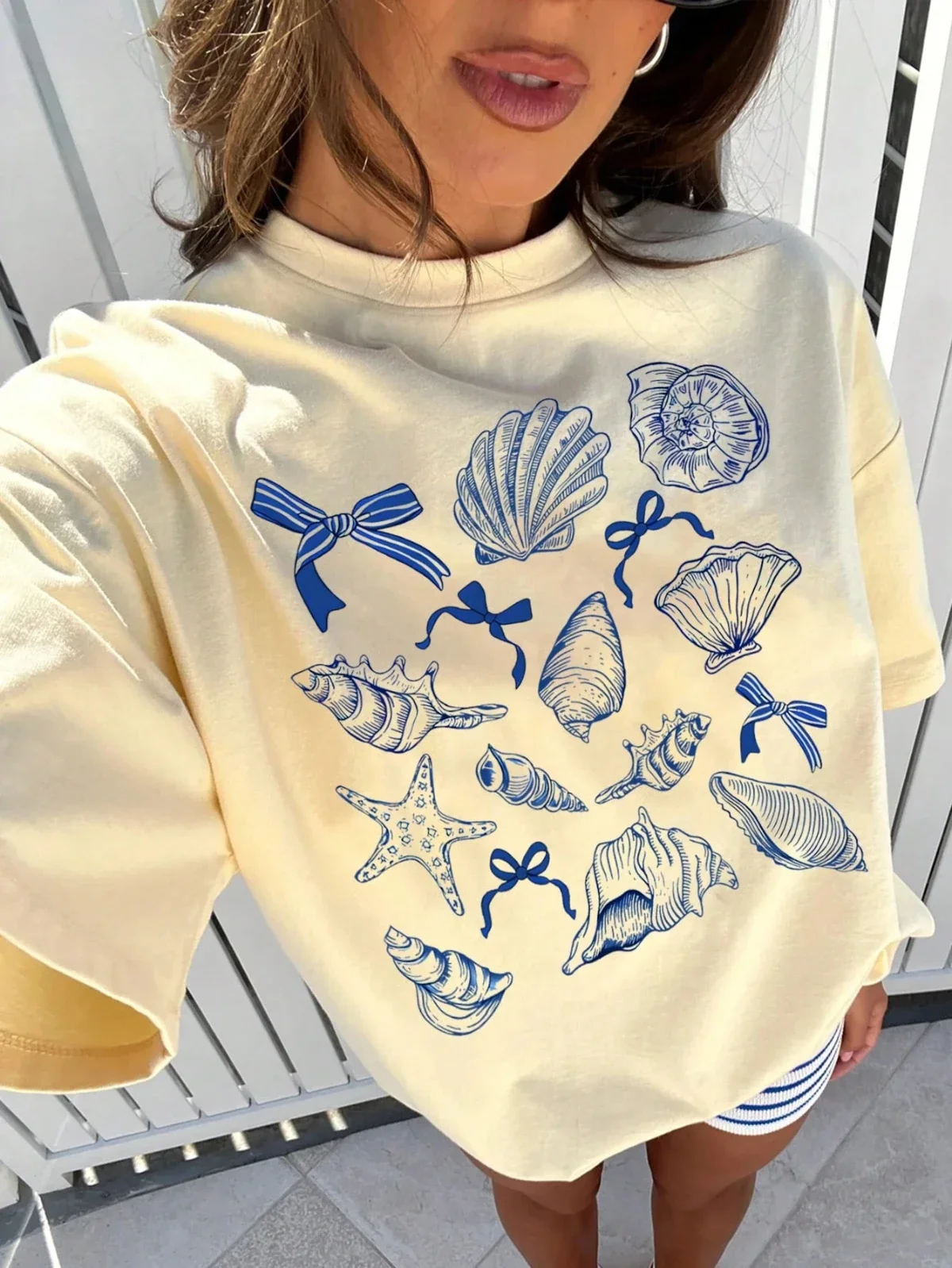 Camiseta Retro americana Y2k con diseño de lazo de concha de Animal marino para mujer, ropa de calle holgada con cuello redondo, Top de media manga