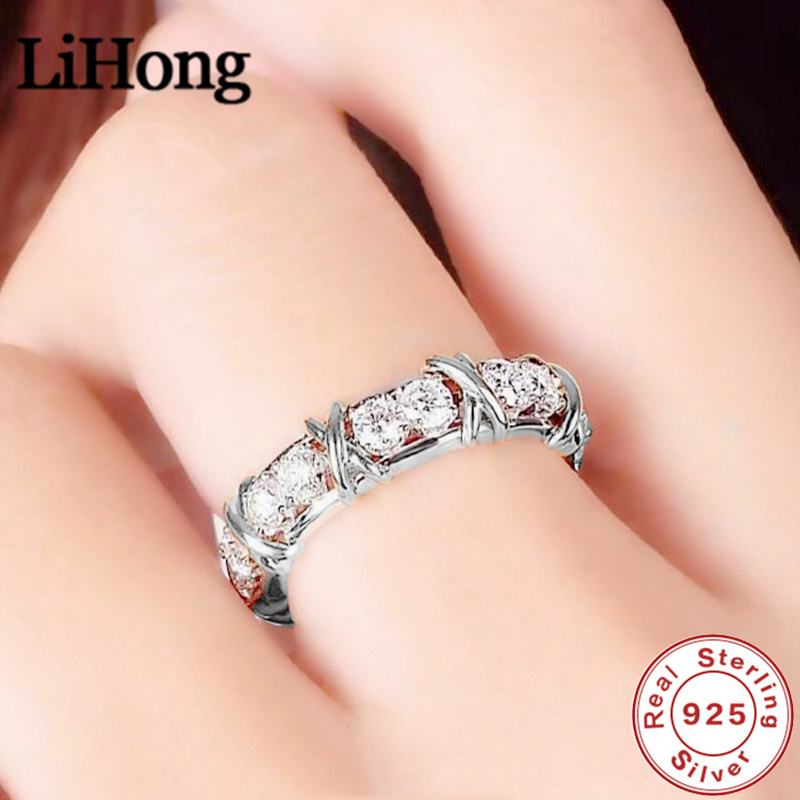 Anillo de plata de ley 925 de lujo entrelazado con anillo de cristal de circón Aaa para regalo de joyería de compromiso de una mujer 2 opciones de color