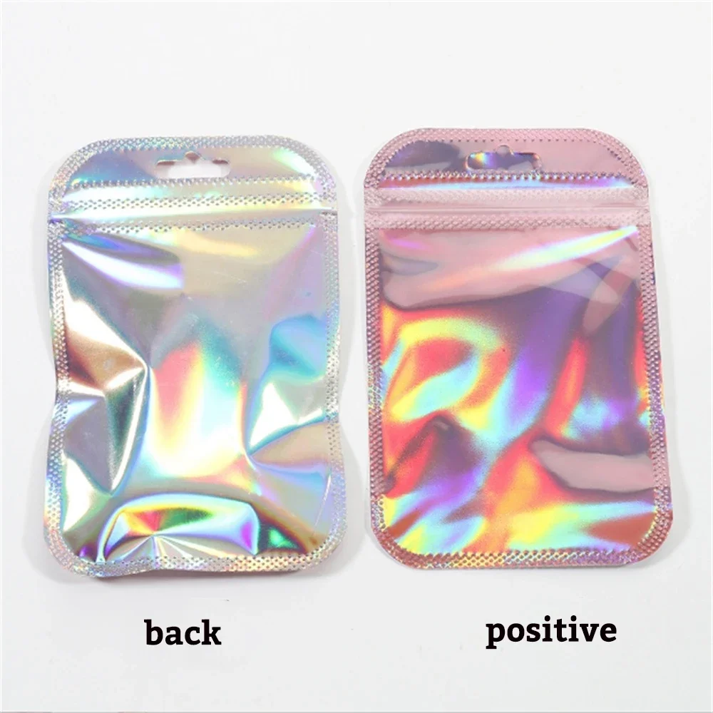 50/100 Stück schillernde selbstdichtende Beutel, rosa Laser-Kunststoffbeutel, wiederverschließbare Zip-Lock-Verpackung für Schmuck-Display-Einzelhandelsbeutel