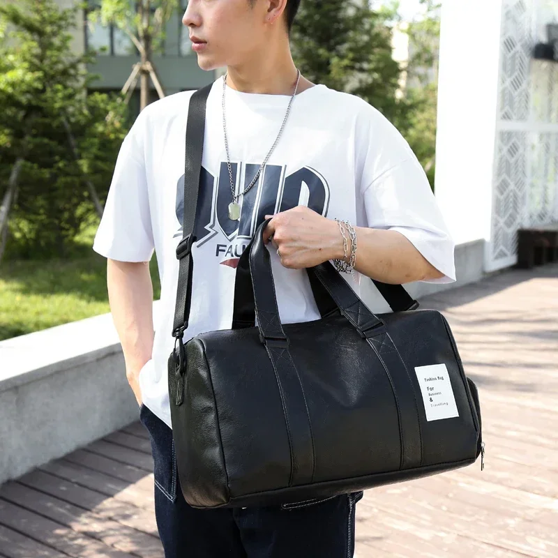 กระเป๋าถือสำหรับผู้ชายและผู้หญิงกระเป๋าเดินทางแบบพกพากันน้ำ PU กระเป๋าฝึกกีฬาฟิตเนสกระเป๋าเดินทางขายดี