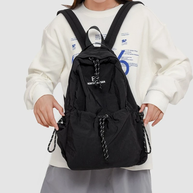 Solid Nylon Large Capacity Backpack 2025 Hot Selling Air Cushion Strap Soft Casual Backpack Soft Handle Outer Frame School Bags