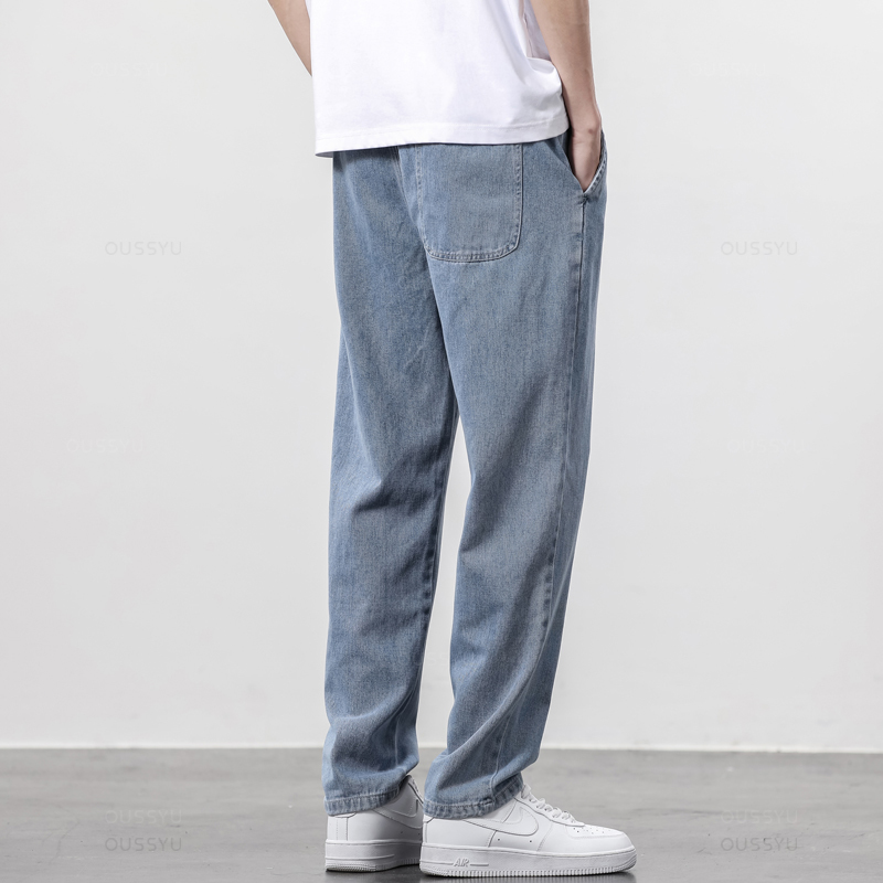 Jesienno-zimowe męskie dżinsy bawełniane miękkie proste spodnie ze sznurkiem w pasie Vintage Korea spodnie typu casual męskie Plus rozmiar S-5XL