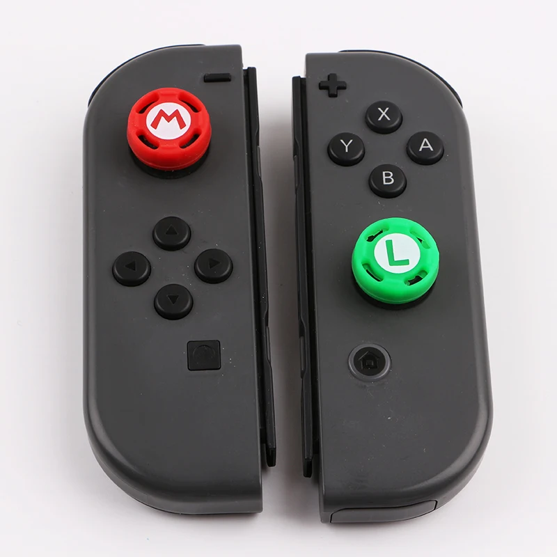 Manopole per joystick analogiche in silicone da 4 pezzi per Nintend Switch JoyCon Controller Thumb Sticks Cap Skin per Switch Lite Accessori di copertura