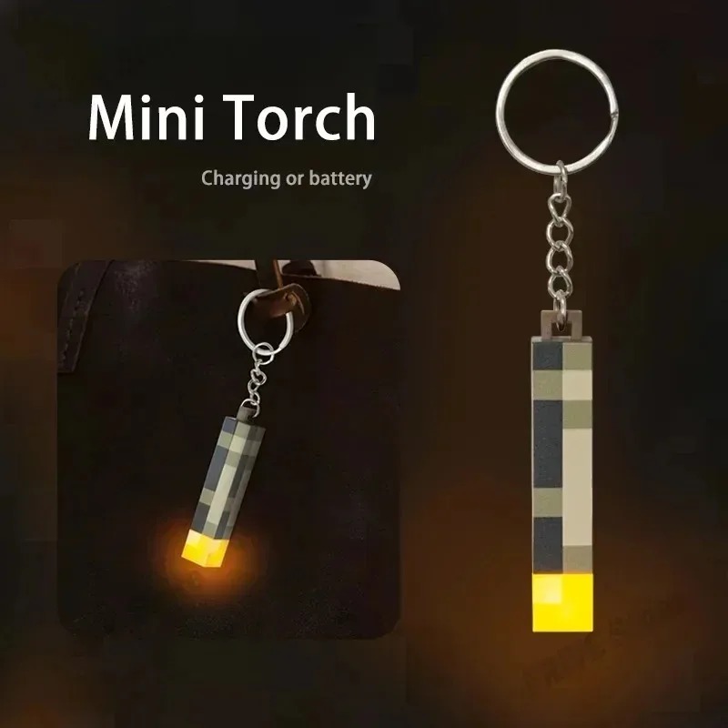 --2025 New World Torch Light Torch Can Shine Keychain Mini Model Pendant Toy Most Popular Festival Mode