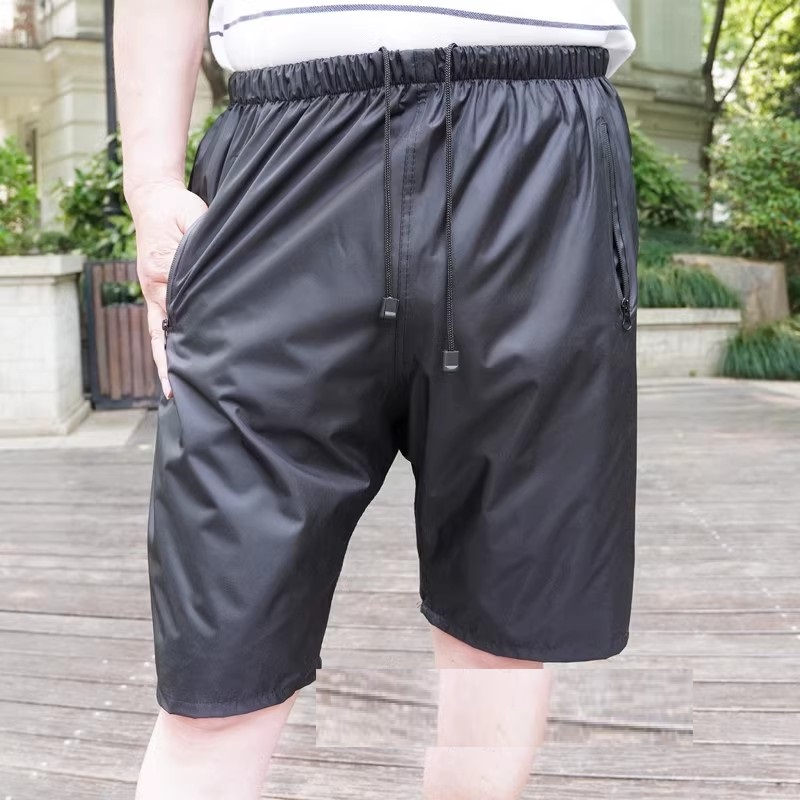 Shorts impermeáveis impermeáveis à prova de chuva do homem com bolso impermeável do zíper