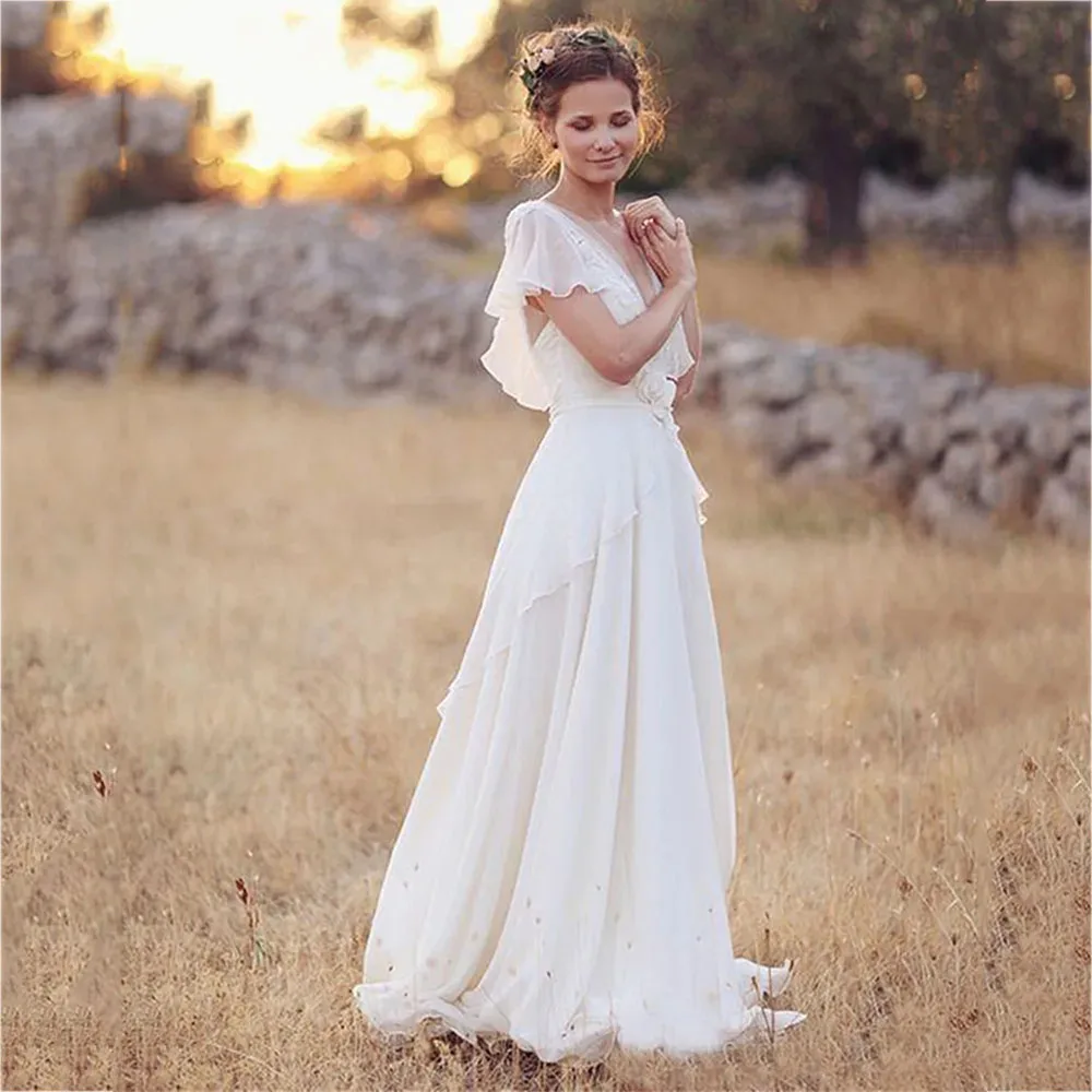 Abiti da sposa Boho personalizzati con scollo a V in chiffon A Line maniche corte Backless Piano Lunghezza Ruffles Beach Abiti da sposa Bohemian