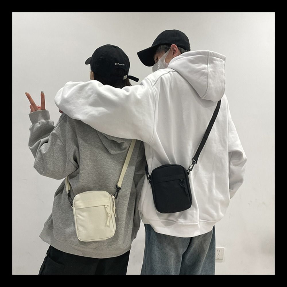 กระเป๋าสะพายคาดลำตัวสีกากีสีขาวสีดำกระเป๋าผ้าอ๊อกซ์ฟอร์ดขนาดเล็กกระเป๋าโท้ท Tali bahu ยาวเก็บของสำหรับเดินทางผู้ชายผู้หญิง