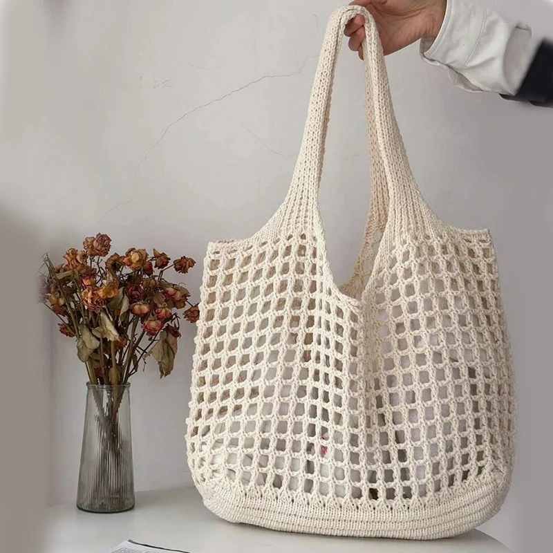 Bolso de mano de ganchillo para mujer, bolso de playa hueco, bolso tejido de moda de gran capacidad, bolso de compras Simple de Color sólido para viajes y vacaciones
