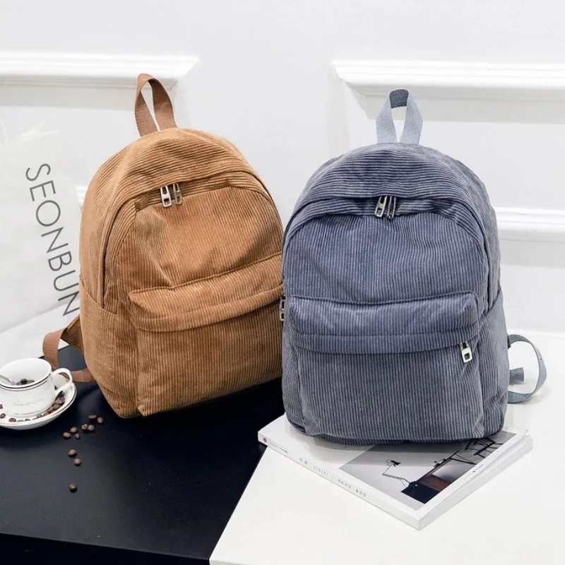 ใหม่ Corduroy ผู้ชายและผู้หญิงกระเป๋าเป้สะพายหลังสไตล์วิทยาลัยอเนกประสงค์และขนาดใหญ่กลางแจ้งอินเทรนด์กระเป๋านักเรียนนักเรียน