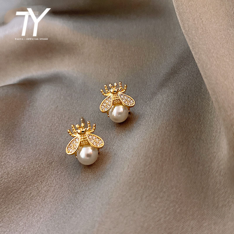 2025 nouveau simple et luxueux perle femme boucles d'oreilles design de mode sens abeille insecte boucles d'oreilles femmes coréennes bijoux sexy boucles d'oreilles