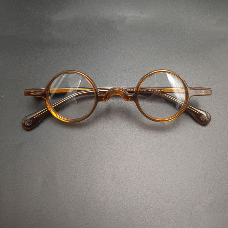 Occhiali da vista retrò vintage con montatura rotonda piccola in acetato marrone trasparente, con lenti da 34 mm di diametro