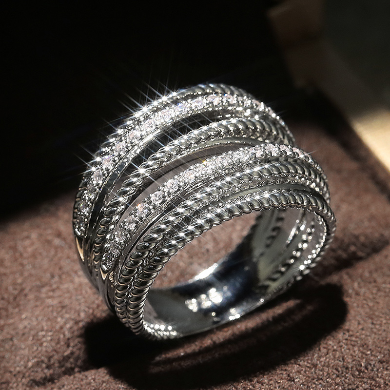 Huitan, anillos de boda cruzados de lujo para novia, deslumbrante cristal CZ de interés especial, anillos de joyería simples y elegantes para mujer