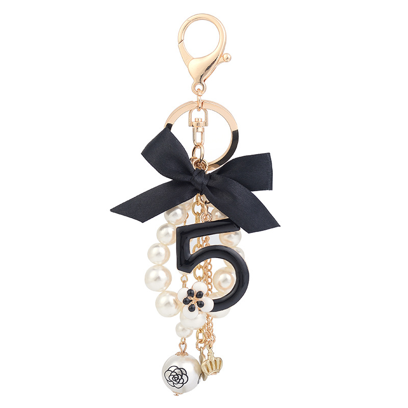 Colgante de bolso de Camelia número 5 para mujer, joyería de lujo, llavero de coche con lazo, llaveros de perlas de Camelia, decoración de bolso